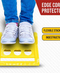 Person standing on 20 Pack 4 Inch Edge Protectors For Flatbed Trucks With Mesh Carrying Case, Yellow Plastic Corner Guards