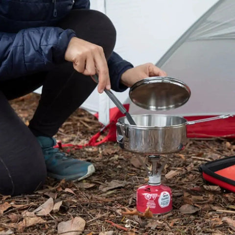 Beefy Stainless Steel Stowaway Camping Pot 475 mL With Locking Lid And Fold Over Handle Ultra Durable Lightweight Cook Pot In Use