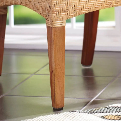 Wooden chair leg with 40 Piece Brown Round No Slip Floor Protectors For Chair And Table Legs Noise Proof Glides visible on tile floor.
