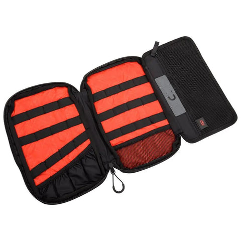 Open view of Off Road Motorcycle And Powersports Tool Pack with red interior, magnetic strip, and zipper pocket.