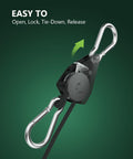 Heavy Duty Adjustable Rope Hanger Set With Ratchet Straps And Pulley Gear shown with carabiner and arrow for easy operation