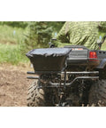 UTV And ATV Receiver Mount Broadcast Spreader Seeder For Easy Lawn And Garden Seeding 80 Pound Capacity 12 Volt Power Quick Install Harness Rain Cover Included attached to ATV.