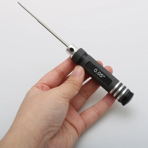 Hand holds Four Piece Hex Key Screwdriver Set With Straight Handle Allen Wrenches For Hobby RC Drones And Model Aircraft Maintenance