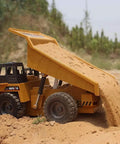 Rad Remote Control Dump Truck Toy 2.4G RC 6 Channel Bulldozer with open bed unloading sand outdoors