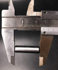 DONSP1986 clutch repair kit: close-up of a caliper measuring a small steel clutch shaft pin