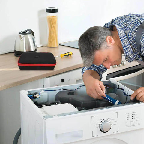 Man repairing a washing machine with tools nearby and a Heavy Duty Eva Waterproof Hard Shell Tool Tote for organization.