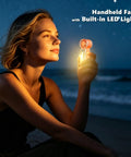 Woman holding Beast Portable Handheld Fan On The Go With USB-C Rechargeable Battery, digital display lit at night