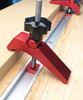 Aluminum T Track Hold Down Clamp For Woodworking securely positioned on a wooden board, showcasing ergonomic grip and strong clamping force.