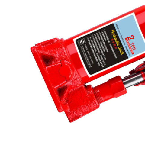 Heavy Duty Top Shelf Rock Solid Two Ton Hydraulic Bottle Jack Smooth Manual Car Lift For Garage And Shop, red steel design close-up