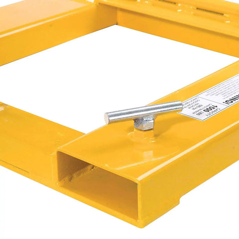 Close-up of 1500 Lb Capacity Single Fork Mounted Drum Gripper with lock screw and yellow hinged folding arm.
