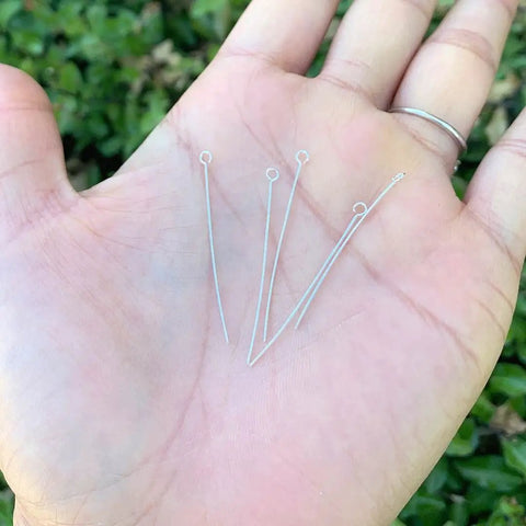 50 Pcs Real Sterling Silver Eye Pins 35mm Long 0.4mm Gauge For Jewelry Making Diy Crafting Hypoallergenic Nickel Free Lead Free Durable Findings For Earrings Pendants Beads, shown in hand