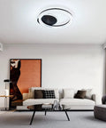 Room with White Finish Modern Flush Mount Circle Ring LED Ceiling Light With Three Color Temperature Settings For Living Room Bedroom And Restaurant Acrylic Ring Fixture Sleek Yet Bright Ambience