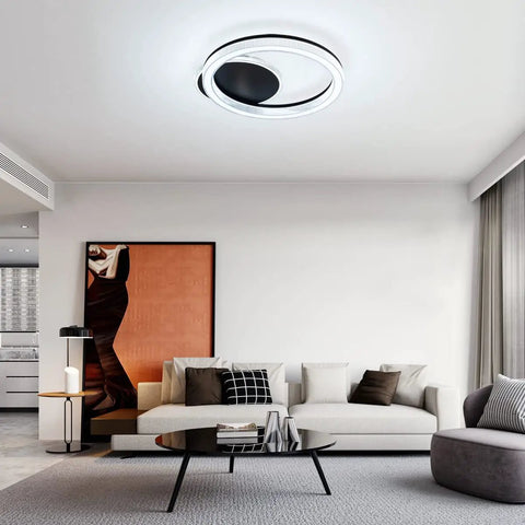 Room with White Finish Modern Flush Mount Circle Ring LED Ceiling Light With Three Color Temperature Settings For Living Room Bedroom And Restaurant Acrylic Ring Fixture Sleek Yet Bright Ambience