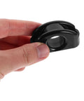 Hand holding a Pair Of Large Nylon Kayak Pulley with Rolling Bearings, black color, for smooth wire guidance on boats and kayaks.