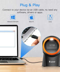 Hands Free 1D 2D Barcode Scanner With QR Reader Plug And Play For Desktop POS Systems Screen Scanning Supported shown next to laptop