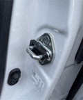 Universal Car Door Lock Dampers That Straight Up Kill The Rattle For Smooth Closings Boost Noise Damping Ease Hinge Strain Heavy Duty Auto Silent Install Kit installed on a car door latch.
