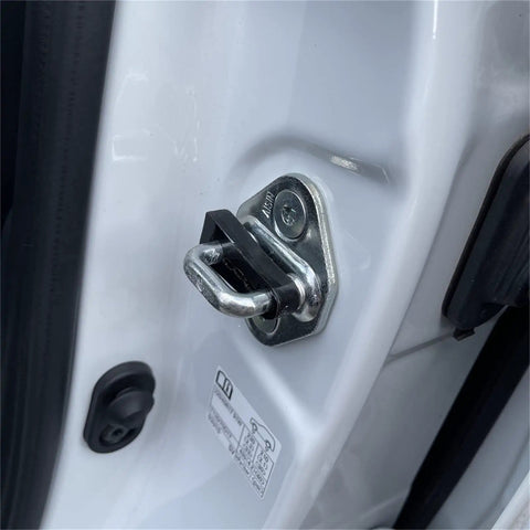 Universal Car Door Lock Dampers That Straight Up Kill The Rattle For Smooth Closings Boost Noise Damping Ease Hinge Strain Heavy Duty Auto Silent Install Kit installed on a car door latch.