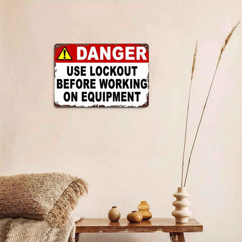 Danger Use Lockout Before Working On Equipment Metal Sign 8x12 Inch Aluminum Wall Decor in a room setting