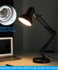 Metal Desk Lamp With Clamp And Swing Arm, Architect Styled Gooseneck Task Light for Home Office, E26 Base, Black, on a desk at night
