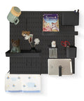 Black pegboard organizer kit with 13 accessories including hooks and containers, wall-mounted in a garage or office.