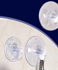 Super Strong Suction Cup Hooks For Bathroom Wall 10 Pack sticks to smooth tile surfaces, ideal for hanging items, clear design.