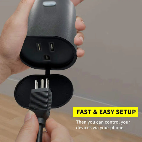Hand holding an Outdoor Weatherproof Smart Plug 2 Pack Featuring Rock Solid 2.4ghz Wifi And Frictionless Alexa Google Assistant Voice Sync.