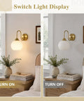 BOKT Ribbed Glass Battery Operated Wall Sconce Set of 2 with 12 RGB Colors displayed on wall, one lit and one off, showcasing design.