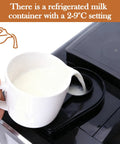 Top Shelf Fully Automatic Espresso Coffee Machine With Built In Milk Cooler And Precision Burr Grinder Featuring A Crisp Touchscreen showing a refrigerated milk container with milk being poured.