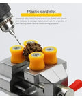 Super Durable Cast Iron Small Bench Vise With Suction Cup Flat Jaws And Precision Clamping Power For Hardwood Carving DIY Projects At Home Workshop Or Garage Table Use in action with plastic card slot.