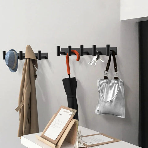 Black Wall Mount Coat Rack With 5 Hooks For Robes, Bags, Towels, Hats And Keys in a hallway with coats and bags hanging