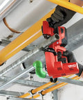 Cordless Band Saw With 22V Battery And LED Light For Cutting Up To 64 mm And 2 1/2 Inch Thick Materials in use on pipe