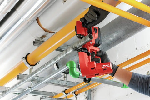 Cordless Band Saw With 22V Battery And LED Light For Cutting Up To 64 mm And 2 1/2 Inch Thick Materials in use on pipe