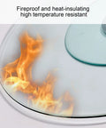 Tempered Glass Lazy Susan Turntable Round Clear Dining Tray For Banquets fire-resistant demonstration with flames on glass surface.