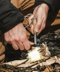 Survival Fire Starter Pro Ferro Rod With Wood Handle Three Eighths Inch Thick Fire Steel Up To 15,000 Strikes in use outdoors