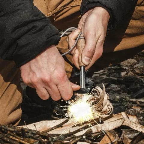 Survival Fire Starter Pro Ferro Rod With Wood Handle Three Eighths Inch Thick Fire Steel Up To 15,000 Strikes in use outdoors