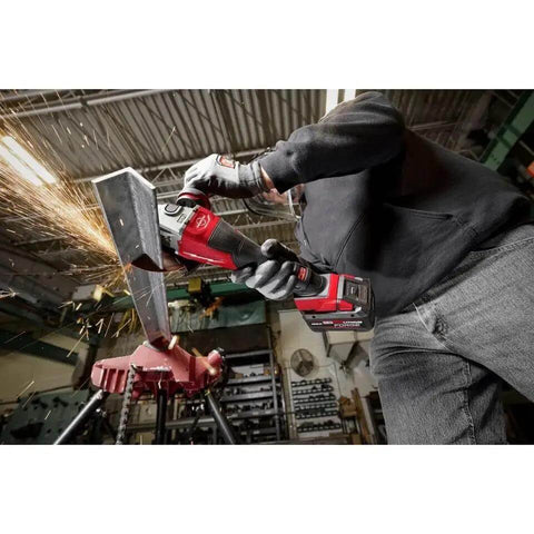 Heavy Duty Angle Grinder Paddle Switch Kit For M18 Fuel 4 Inch To 6 Inch Discs in use, cutting metal with sparks flying.