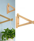 Beefy Wooden Shelf Bracket Heavy Duty Wall Mount Support For Everyday Minimalist Modern Interiors With Pre Drilled Wire Routing 27cm Decorative Shelf Hardware shown with hanging plant