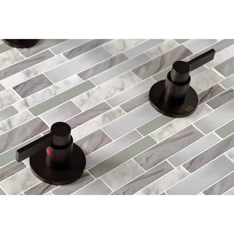 NuvoFusion Double-Handle Tub And Shower Faucet in polished brass with durable brass construction on tiled surface.