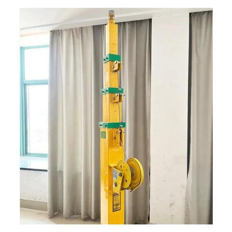 Heavy Duty 9 Meter Manual Winch Telescopic Mast with a sturdy 70kg load rating in yellow for off grid satellite antennas.