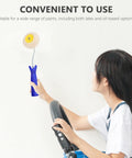 User holding a Double Ended Paint Roller Corner Tool With Comfy Grip Handle For Easy Wall Painting, applying paint on wall.