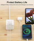 Ultra Compact Six Outlet Surge Protector with phone and tablet charging, space-saving cube design on wooden surface.