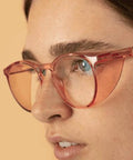 2 Pack Woman Safety Glasses Stand Guard Against Dust And Blue Light With Anti Fog Side Shields Pink Clear Frames Kick Glare While You Grind At Computer Desk UV400 - close-up view on face