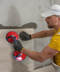 Heavy Duty Vacuum Suction Cups With Double Claw Design For Smooth Glass Tile And Wall Lifting being used to lift a tile.