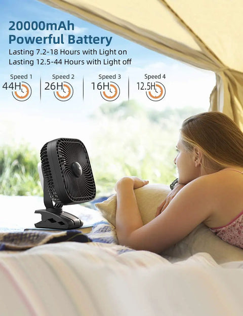Woman relaxing in tent with 20000mAh Rechargeable Clip On Fan With 78 Hours Battery Life 8 Inch Personal Cooling for camping