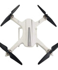 Top view of a white quadcopter equipped with 20Pcs Brushless Drone Propeller Set High Strength Black Blades Easy Install Spare Parts