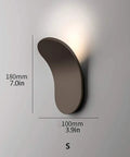 Modern Led Wall Sconce Featuring Smooth Iron Body And Soft Acrylic Diffuser, sleek design shown on wall with dimensions.