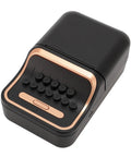 Cool Retro Label Printer With Bluetooth 5.0 Connectivity And Compact Design Perfect For Home Office Organization Tasks Features Inkless Thermal Printing Technology Compatible With A Range Of Paper Widths From Thirty Two Millimeters To Fifty Two top view of compact black label printer with rose gold accents and buttons.