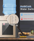 Close-up of hot and cold switch on 3 In 1 Water Dispenser With Ice Cold Hot And Room Temp Water Mini Desktop Water Cooler