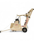 Rugged No Fuss 18 Inch Electric Walk Behind Saw Equipped With A Game Changing Five Horsepower Motor For Clean Down Cutting Up To Six And Three Quarters Inches Engineered For Daily Grind Success, side view of the machine.