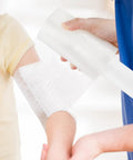 Heavy Duty Clear Stretch Wrap Film With Built In Handle, 4.7 X 492 Feet, being used to secure an arm wrap.